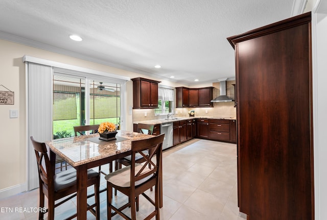 5484 Shadow Branch Ln, Corryton, TN 37721 - kitchen featuring wall chimney exhaust hood, stainless steel dishwasher, dark brown cabinetry, backsplash, and crown molding