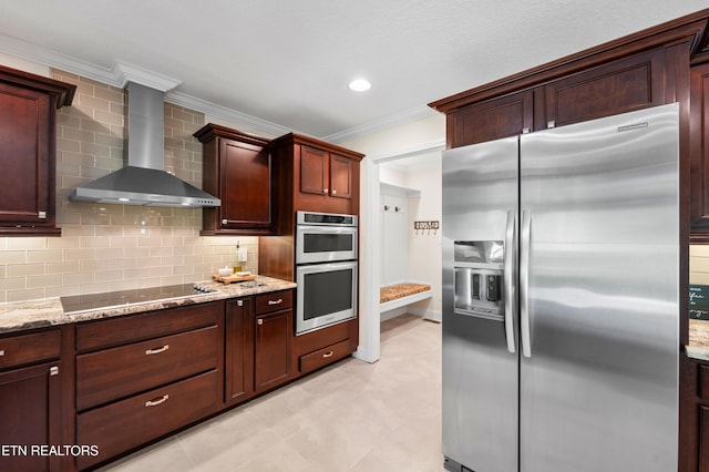 5484 Shadow Branch Ln, Corryton, TN 37721 - kitchen featuring appliances with stainless steel finishes, wall chimney range hood, crown molding, light stone countertops, and decorative backsplash