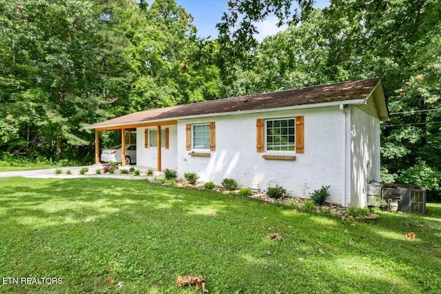 150 Scott Dr, Huntsville, TN 37756 - view of front of property featuring brick siding and a front yard