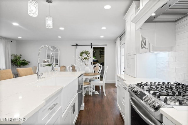 150 Scott Dr, Huntsville, TN 37756 - kitchen with dark wood-style flooring, recessed lighting, stainless steel appliances, white cabinets, and decorative light fixtures