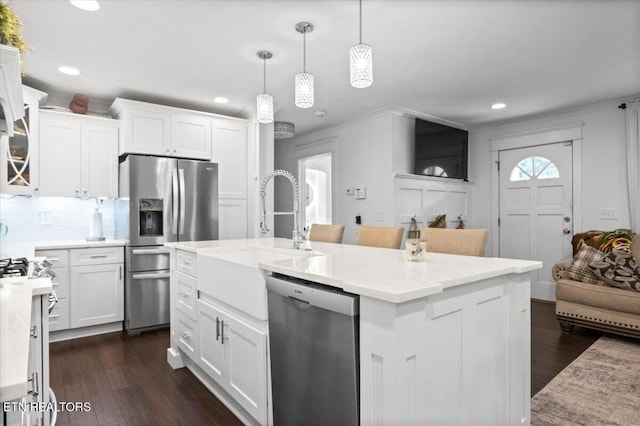 150 Scott Dr, Huntsville, TN 37756 - kitchen featuring appliances with stainless steel finishes, recessed lighting, crown molding, dark wood-style floors, and white cabinetry