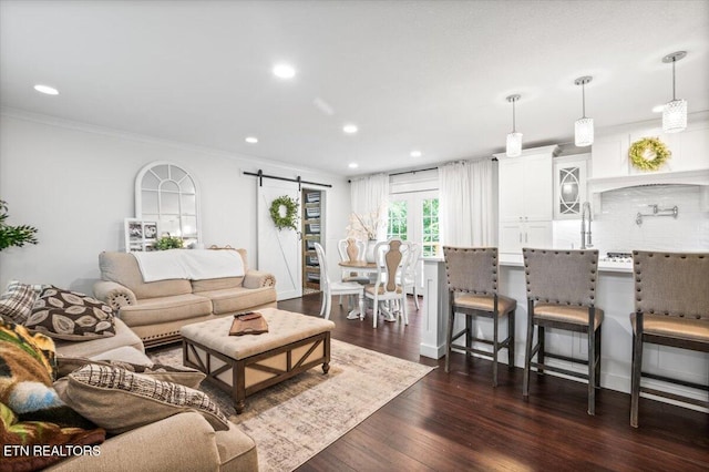 150 Scott Dr, Huntsville, TN 37756 - living area featuring a barn door, recessed lighting, dark wood-type flooring, and crown molding