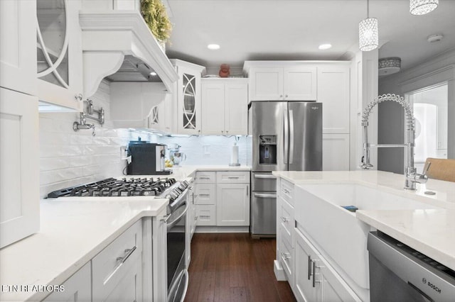 150 Scott Dr, Huntsville, TN 37756 - kitchen with appliances with stainless steel finishes, white cabinetry, light countertops, glass insert cabinets, and recessed lighting