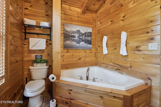 3206 Falling Leaf Way, Pigeon Forge, TN 37863 - bathroom with a whirlpool tub, wooden walls, and wooden ceiling
