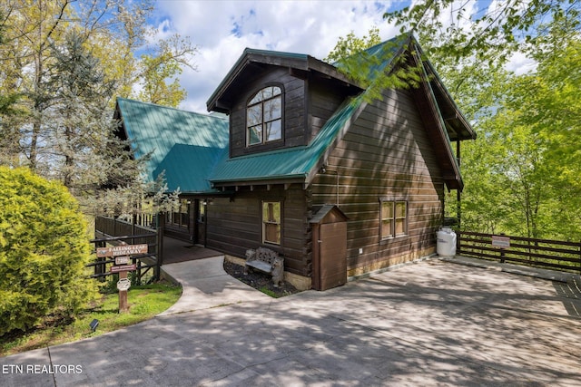 3206 Falling Leaf Way, Pigeon Forge, TN 37863 - view of front of home featuring a metal roof