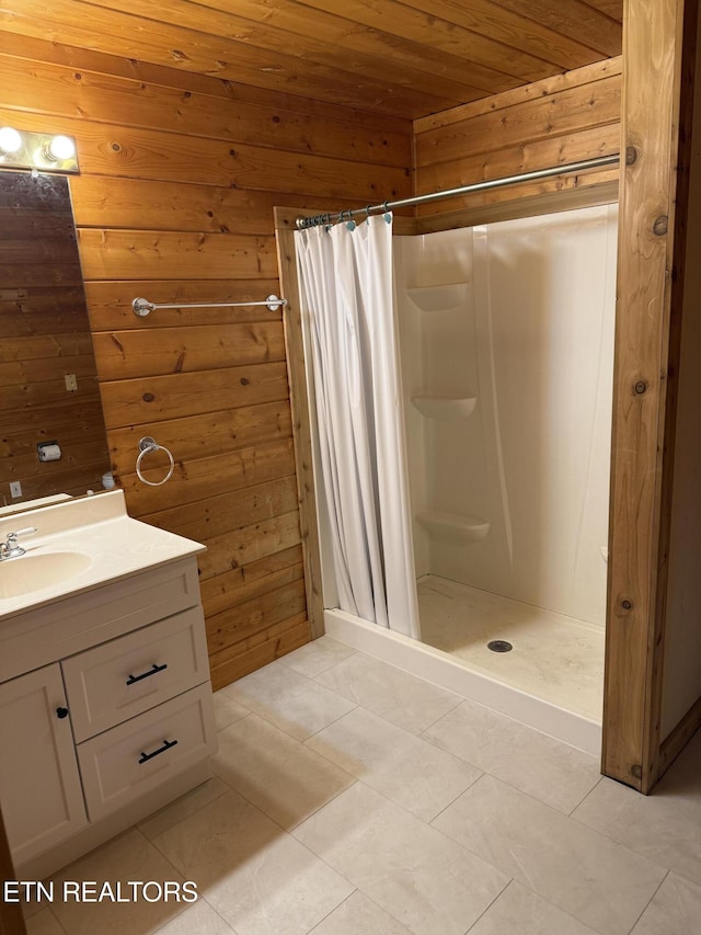 2006 Regans Ridge Way, Sevierville, TN 37876 - full bathroom with wood walls, wood ceiling, vanity, a shower stall, and tile patterned floors