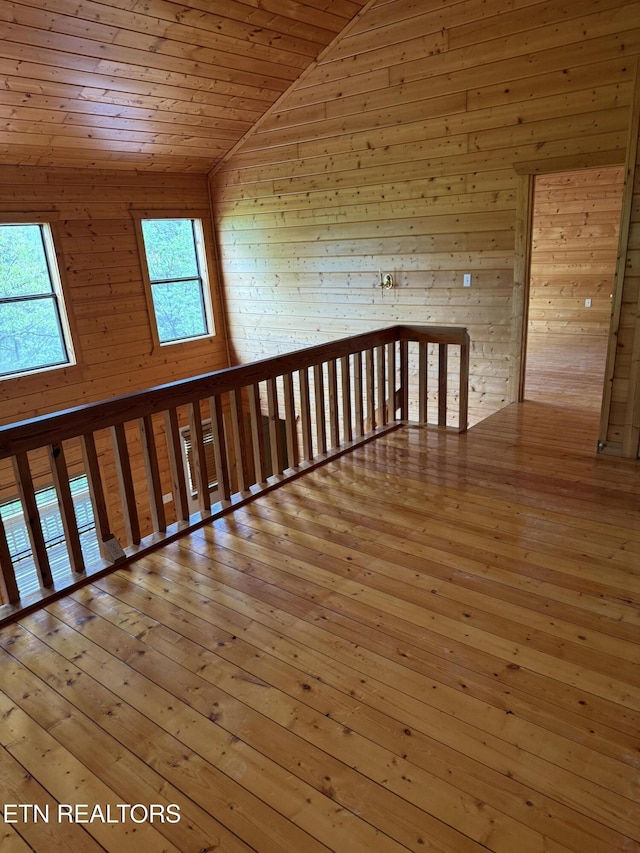 2006 Regans Ridge Way, Sevierville, TN 37876 - corridor with wooden walls, vaulted ceiling, and hardwood / wood-style floors
