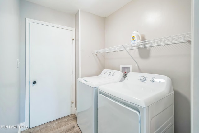 769 Gilmore Rd, Bean Station, TN 37708 - washroom with light wood-style floors and washer and clothes dryer