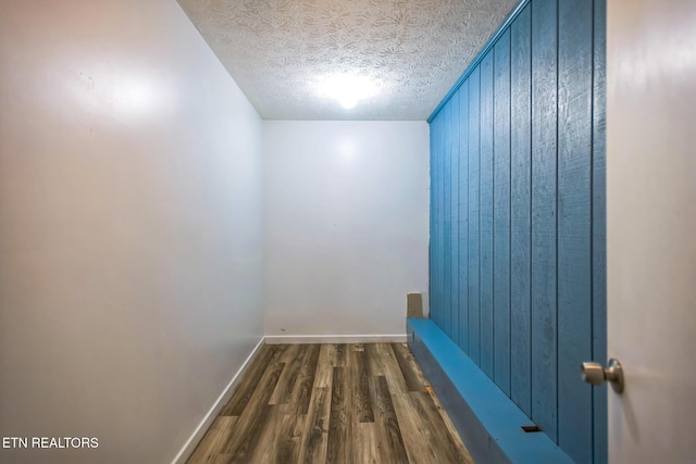 769 Gilmore Rd, Bean Station, TN 37708 - corridor featuring wood finished floors and a textured ceiling