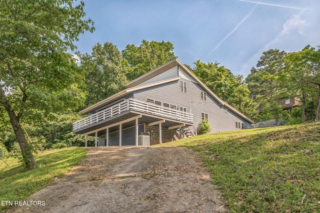 769 Gilmore Rd, Bean Station, TN 37708 - view of side of property with a deck and driveway