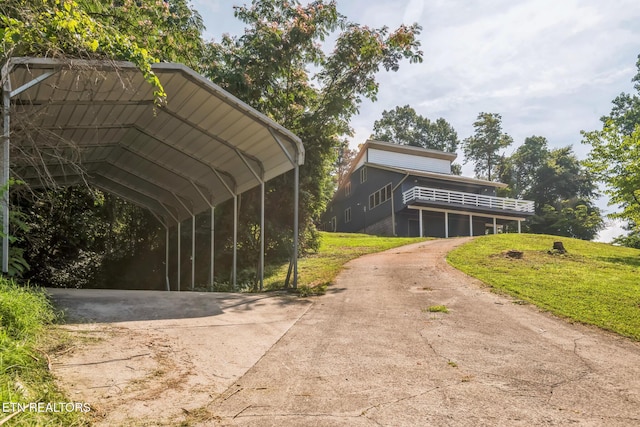 769 Gilmore Rd, Bean Station, TN 37708 - view of outdoor structure with driveway and a detached carport