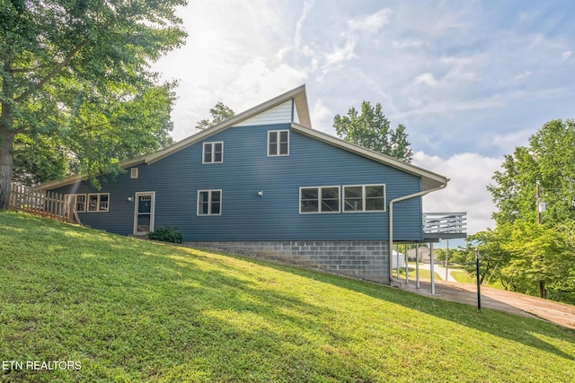 769 Gilmore Rd, Bean Station, TN 37708 - view of side of home with a yard, a deck, and driveway