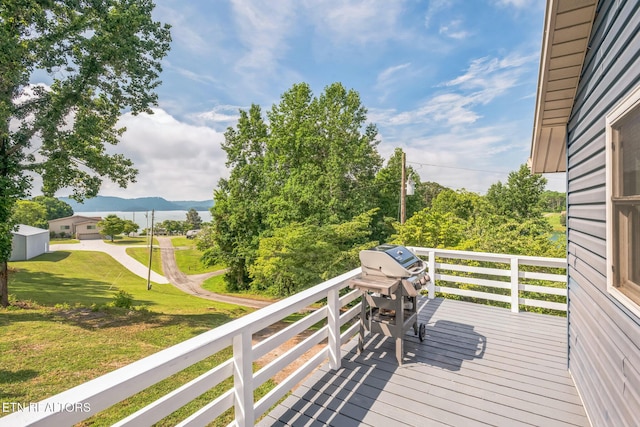 769 Gilmore Rd, Bean Station, TN 37708 - deck featuring a mountain view, a yard, and grilling area