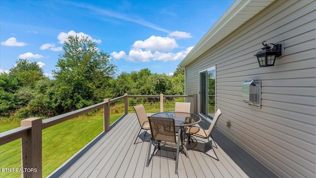 214 Unutsi Trl, Vonore, TN 37885 - wooden terrace featuring outdoor dining space and a yard