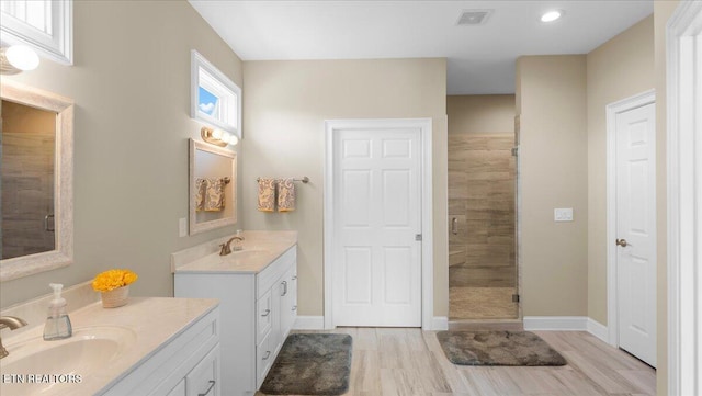 214 Unutsi Trl, Vonore, TN 37885 - full bath featuring a shower stall, two vanities, and recessed lighting