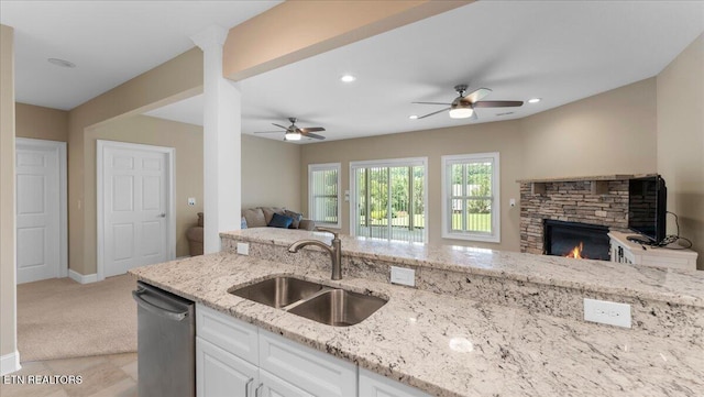 214 Unutsi Trl, Vonore, TN 37885 - kitchen featuring open floor plan, stainless steel dishwasher, ceiling fan, a fireplace, and recessed lighting