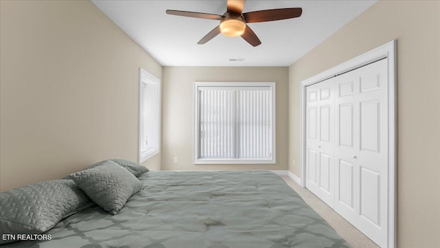 214 Unutsi Trl, Vonore, TN 37885 - carpeted bedroom with a closet and a ceiling fan