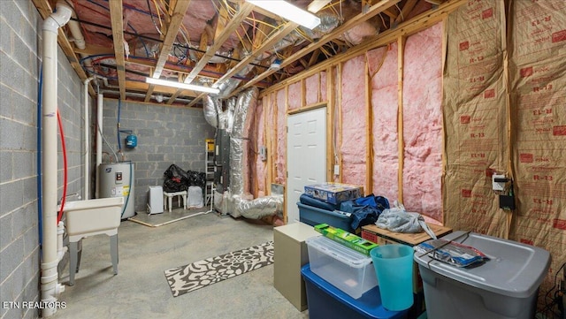 214 Unutsi Trl, Vonore, TN 37885 - unfinished below grade area featuring water heater and concrete block wall