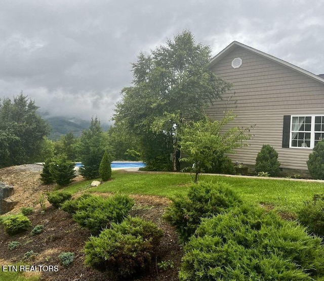 331 Hardin Rd, Dunlap, TN 37327 - view of home's exterior featuring crawl space, an outdoor pool, and a yard