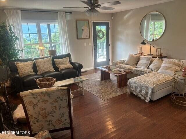 331 Hardin Rd, Dunlap, TN 37327 - living room featuring a ceiling fan, dark wood-style floors, and healthy amount of natural light