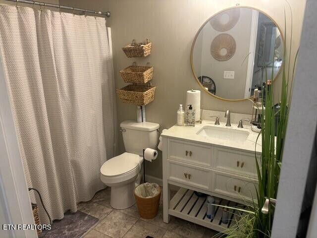 331 Hardin Rd, Dunlap, TN 37327 - full bathroom featuring vanity, a shower with curtain, and tile patterned flooring