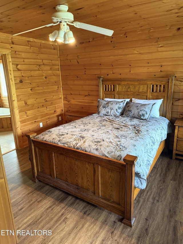 1960 Regans Ridge Way, Sevierville, TN 37876 - bedroom featuring wood finished floors, a ceiling fan, wood ceiling, and wood walls