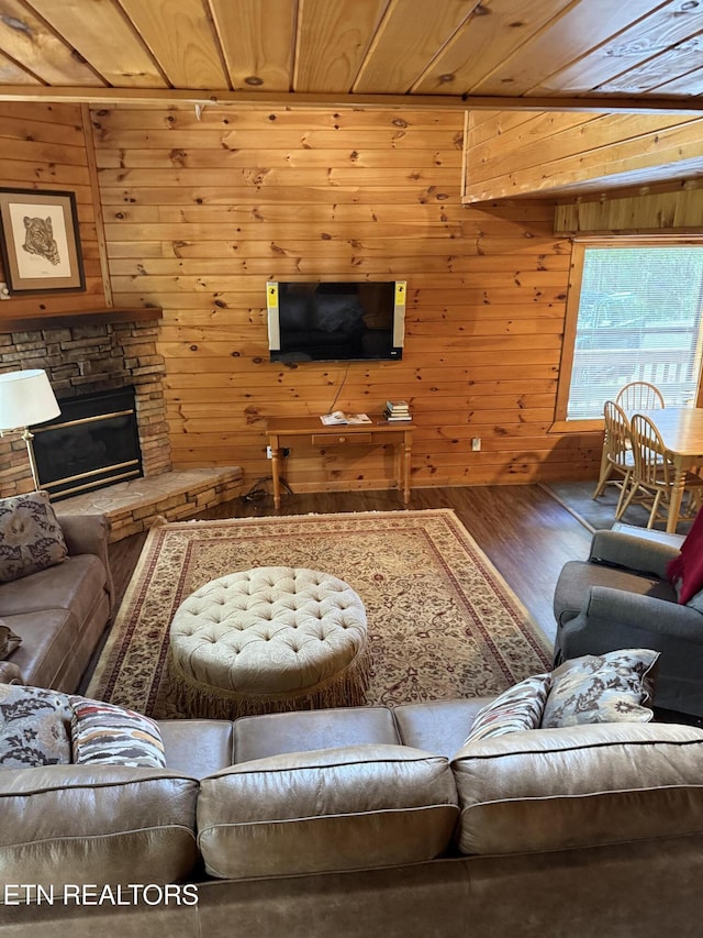 1960 Regans Ridge Way, Sevierville, TN 37876 - living area featuring wood finished floors, wood walls, and a fireplace