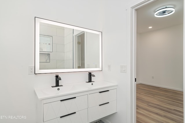 2824 Linden Ave, Knoxville, TN 37914 - bathroom featuring double vanity and wood finished floors