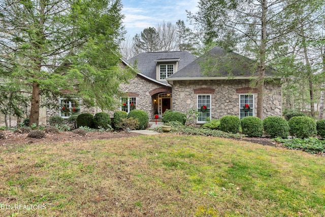 453 Mount John Loop, Townsend, TN 37882 - view of front of property featuring stone siding, a front lawn, and a shingled roof