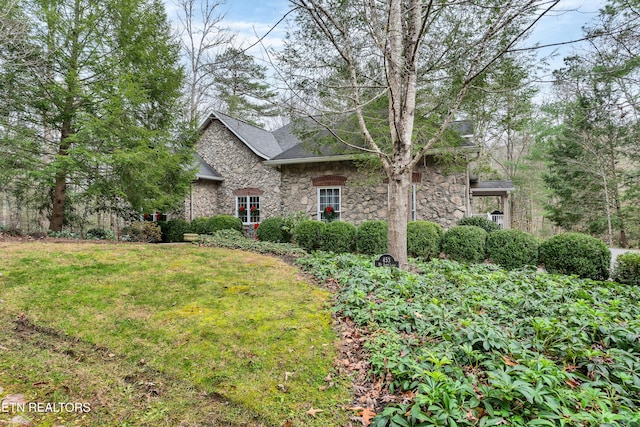 453 Mount John Loop, Townsend, TN 37882 - view of side of home featuring stone siding and a lawn