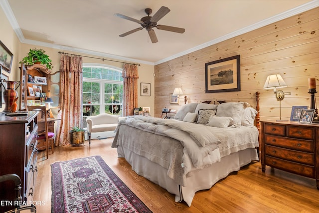 453 Mount John Loop, Townsend, TN 37882 - bedroom featuring light wood-style floors, crown molding, wood walls, and ceiling fan