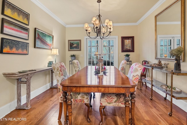 453 Mount John Loop, Townsend, TN 37882 - dining area featuring wood finished floors, a chandelier, and crown molding