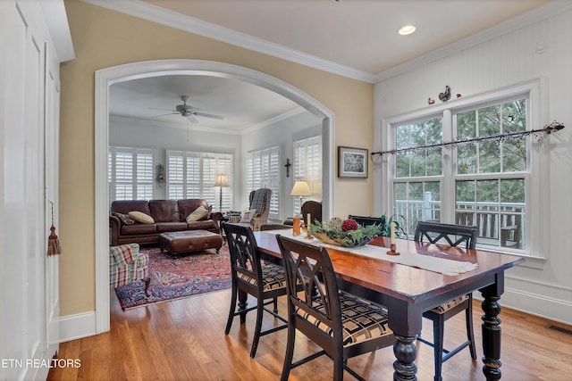 453 Mount John Loop, Townsend, TN 37882 - dining room featuring ceiling fan, arched walkways, wood finished floors, ornamental molding, and recessed lighting