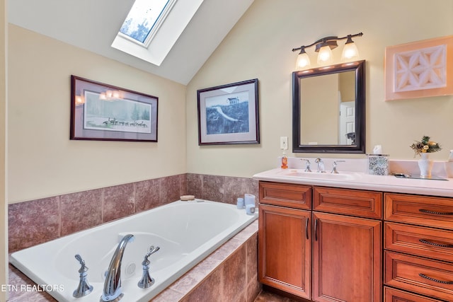 453 Mount John Loop, Townsend, TN 37882 - full bath with a skylight, vaulted ceiling, vanity, and a bath