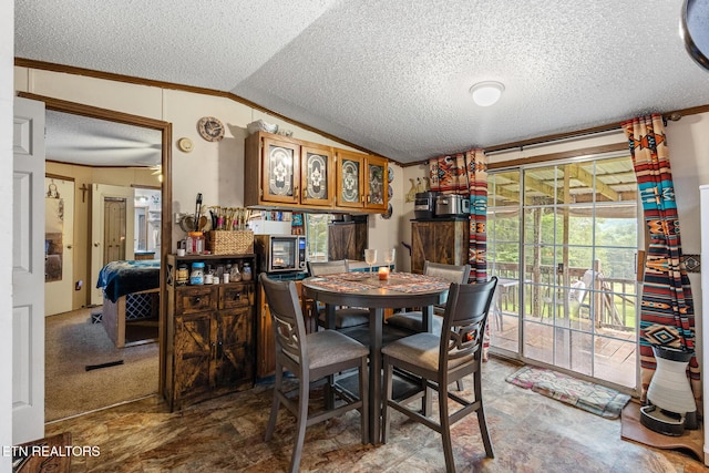 205 County Road 652, Athens, TN 37303 - dining room featuring a textured ceiling, vaulted ceiling, and ornamental molding