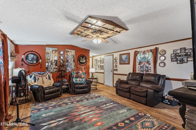 205 County Road 652, Athens, TN 37303 - living room featuring ceiling fan, wood finished floors, ornamental molding, and a textured ceiling