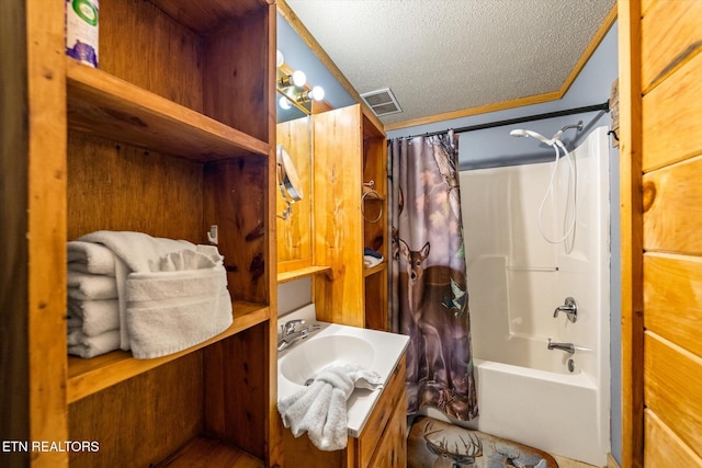 664 Kings Hills Blvd, Pigeon Forge, TN 37863 - full bath with vanity, a textured ceiling, and shower / bath combo with shower curtain