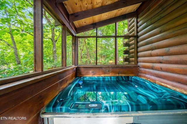 664 Kings Hills Blvd, Pigeon Forge, TN 37863 - unfurnished sunroom featuring a pool and a hot tub