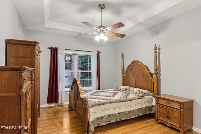 317 Fallen Oak Cir, Seymour, TN 37865 - bedroom featuring light wood finished floors and a ceiling fan