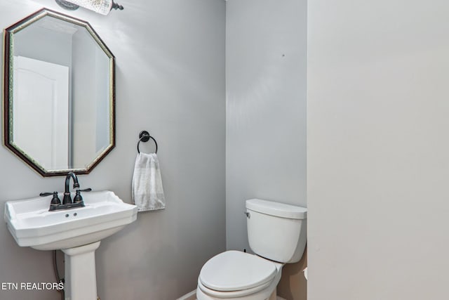 317 Fallen Oak Cir, Seymour, TN 37865 - bathroom with toilet and baseboards