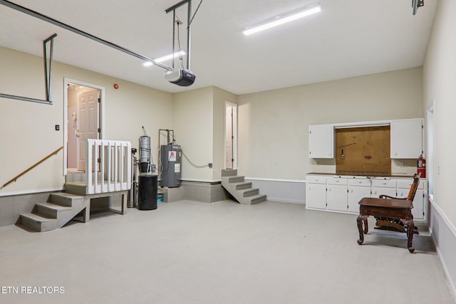 317 Fallen Oak Cir, Seymour, TN 37865 - garage with water heater and a garage door opener