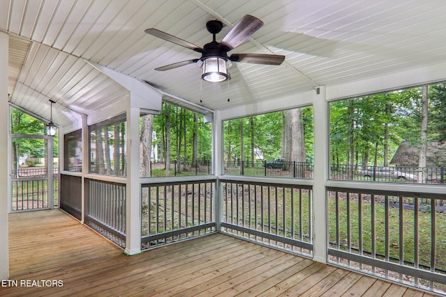 317 Fallen Oak Cir, Seymour, TN 37865 - unfurnished sunroom with ceiling fan and view of wooded area