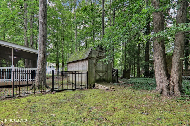 317 Fallen Oak Cir, Seymour, TN 37865 - view of yard with a sunroom and a storage unit