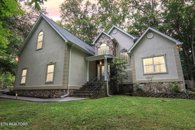 317 Fallen Oak Cir, Seymour, TN 37865 - traditional-style home with stucco siding and a yard