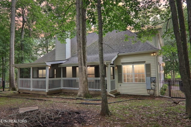 317 Fallen Oak Cir, Seymour, TN 37865 - view of front of property featuring roof with shingles, a chimney, and a porch