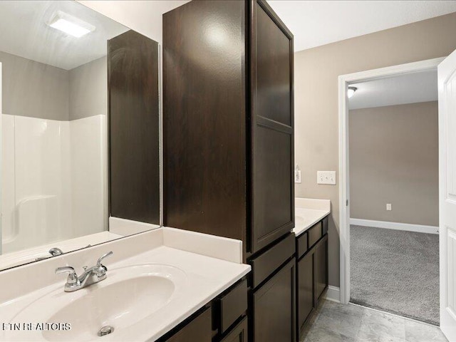 2415 Flannery Way, Powell, TN 37849 - bathroom with vanity and baseboards