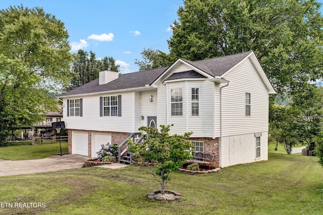 6718 Farmbrook Ln, Knoxville, TN 37918 - split foyer home with driveway, a garage, a front yard, and a chimney