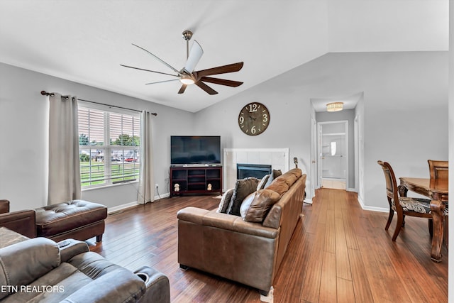 6718 Farmbrook Ln, Knoxville, TN 37918 - living area featuring a ceiling fan, lofted ceiling, wood-type flooring, and a tile fireplace