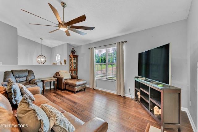 6718 Farmbrook Ln, Knoxville, TN 37918 - living room featuring ceiling fan, a chandelier, and wood finished floors