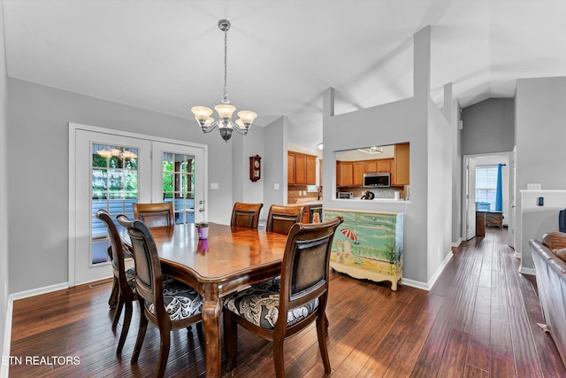 6718 Farmbrook Ln, Knoxville, TN 37918 - dining space with a chandelier, plenty of natural light, and dark wood finished floors